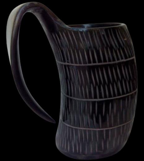 Black horn mug on dark background